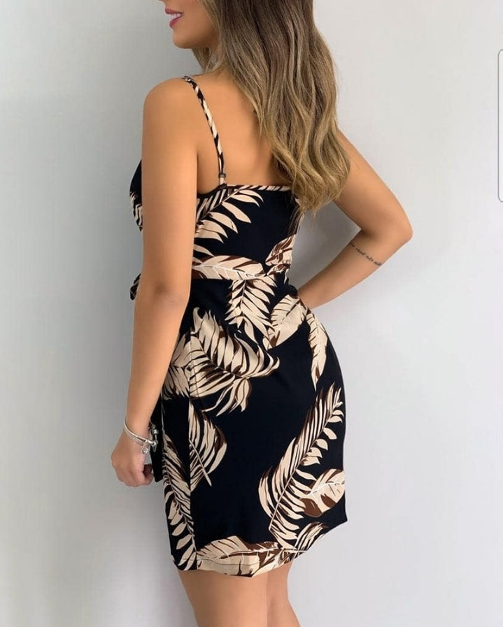 Premièrement : Cette Robe courte décontractée à bretelles spaghetti et col en V à imprimé floral pailetté avec détails croisés Femme.