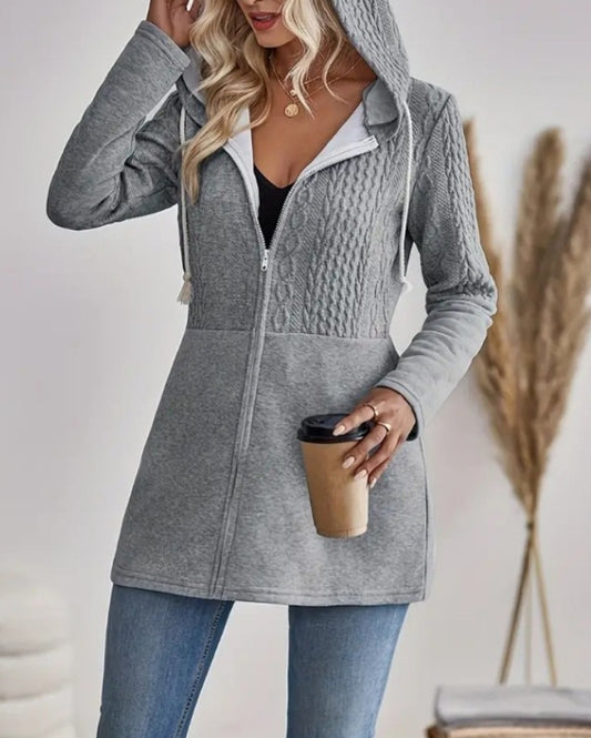 Premièrement : Adoptez un look chic et confortable avec ce Manteau décontracté à capuche avec fermeture éclair et texture torsadée femme 