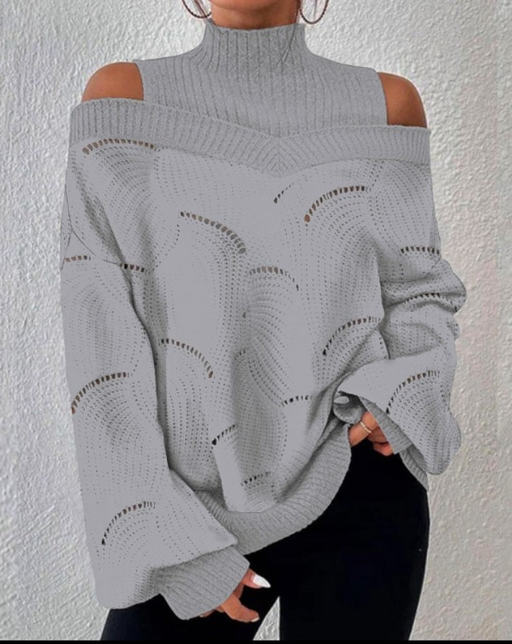 Openwork knit sweater with lantern sleeves and off-the-shoulder