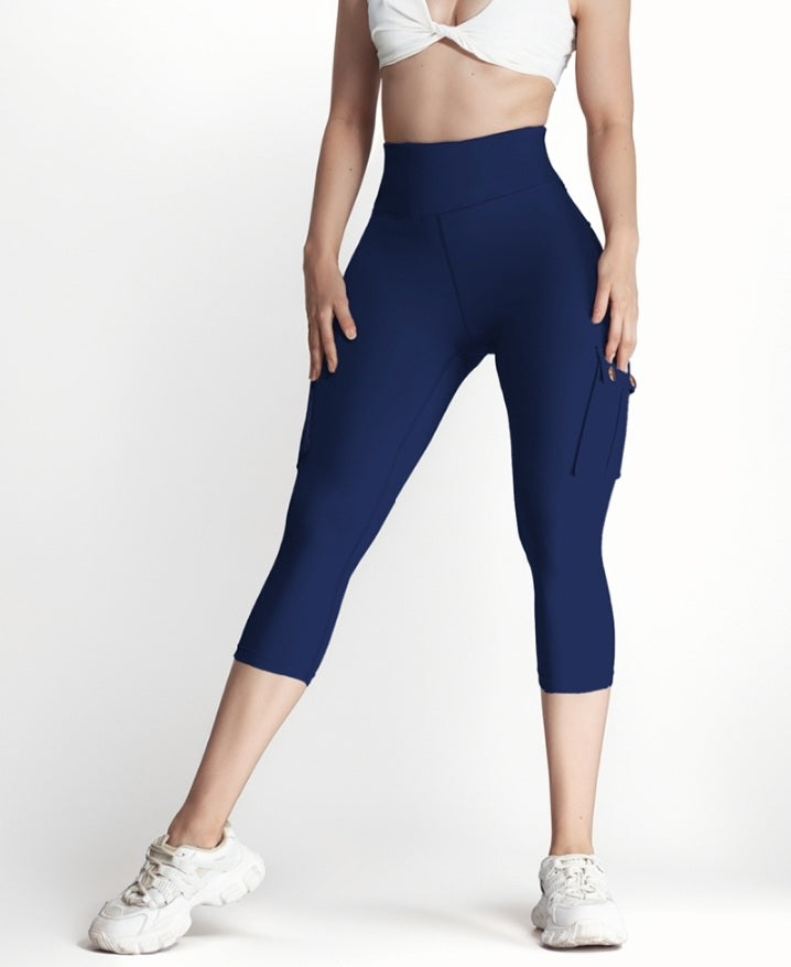 Premièrement : Ce Legging de motard taille haute avec poches à rabat pour soulever les fesses.