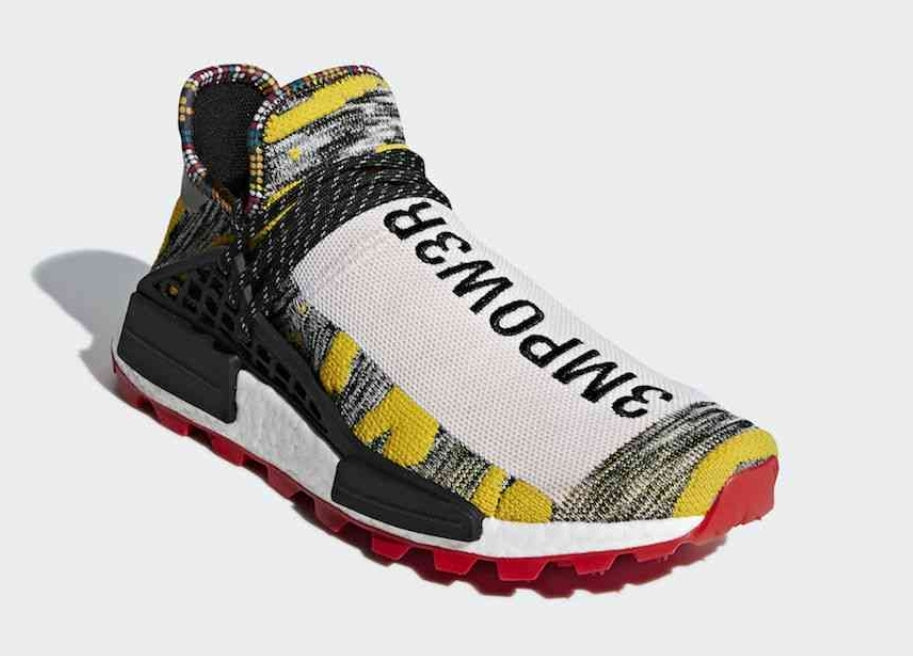 les baskets Adidas Human Race NMD x Pharrell Yellow " Femme  sont un témoignage de l'engagement d'Adidas à combiner style et innovation.