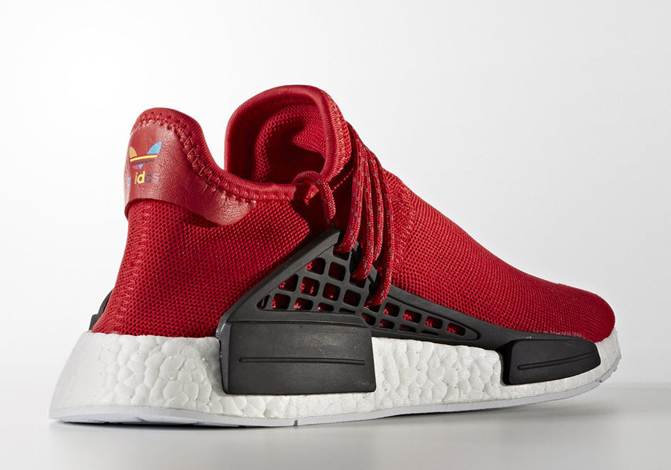 les baskets Adidas Human Race NMD x Pharrell Yellow " Femme  sont un témoignage de l'engagement d'Adidas à combiner style et innovation.
