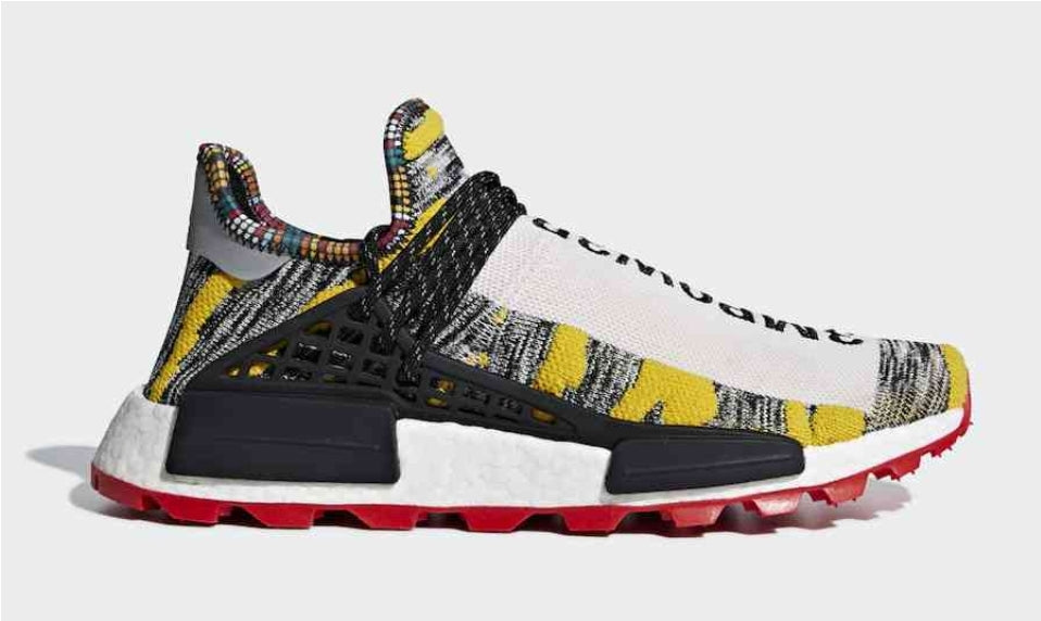 les baskets Adidas Human Race NMD x Pharrell Yellow " Femme  sont un témoignage de l'engagement d'Adidas à combiner style et innovation.