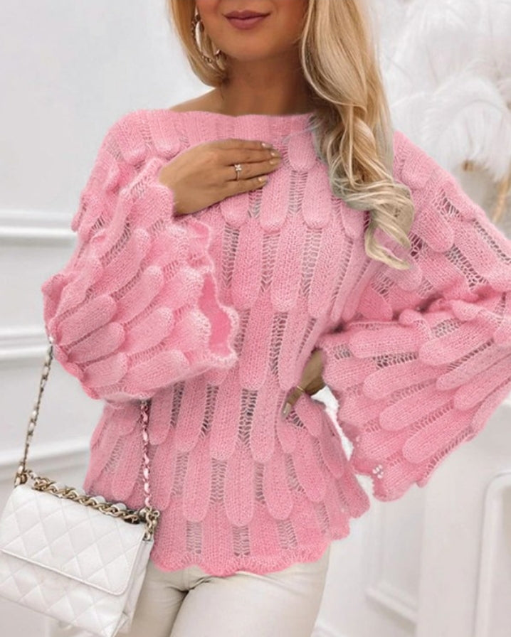 Knitted sweater with bell sleeves and boat neck