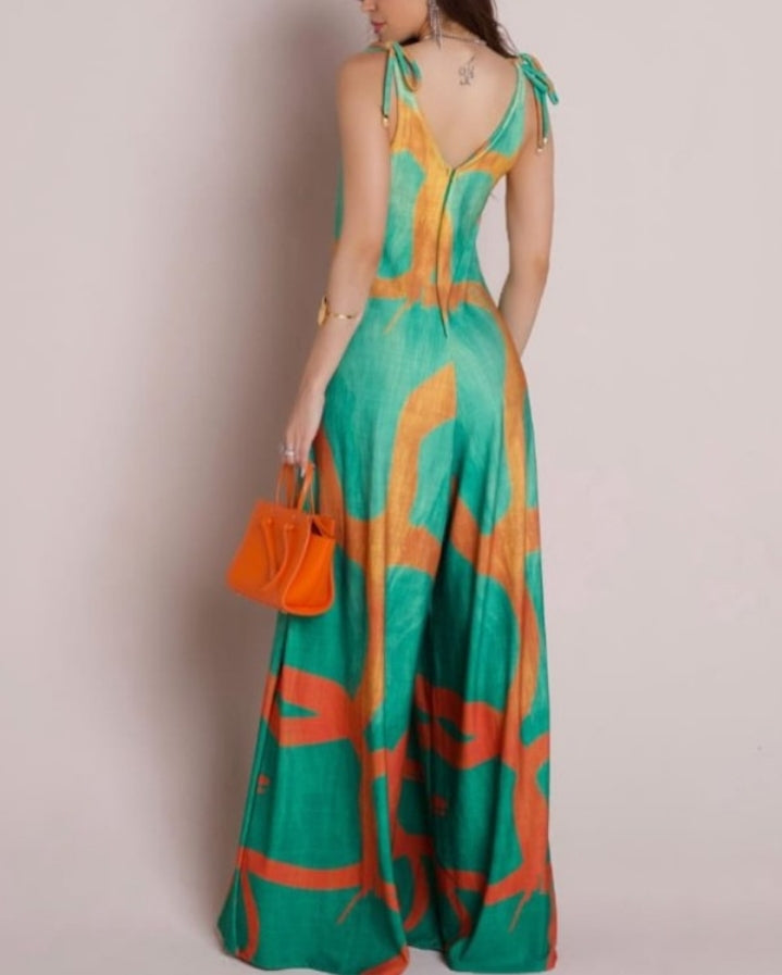 Premièrement : Apportez une touche de fraîcheur et de féminité à votre garde-robe avec cette Combinaison à imprimé floral, col en V, bretelles à lacets , style décontracté avec poches Femme.