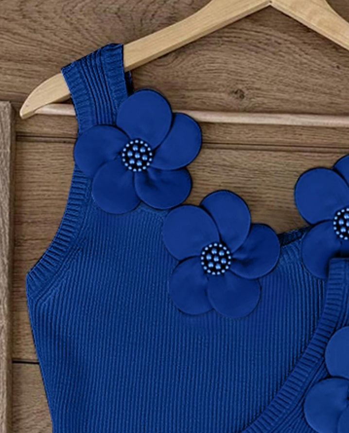 Premièrement : Ce 1 débardeur en tricot à motif floral et perles décoratives sans manches femme.