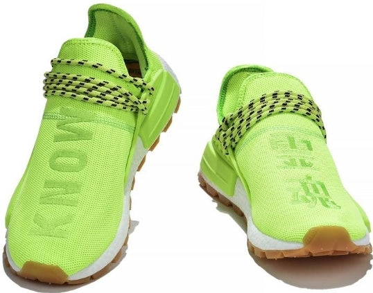 les baskets Adidas Human Race NMD x Pharrell Yellow " Femme  sont un témoignage de l'engagement d'Adidas à combiner style et innovation.