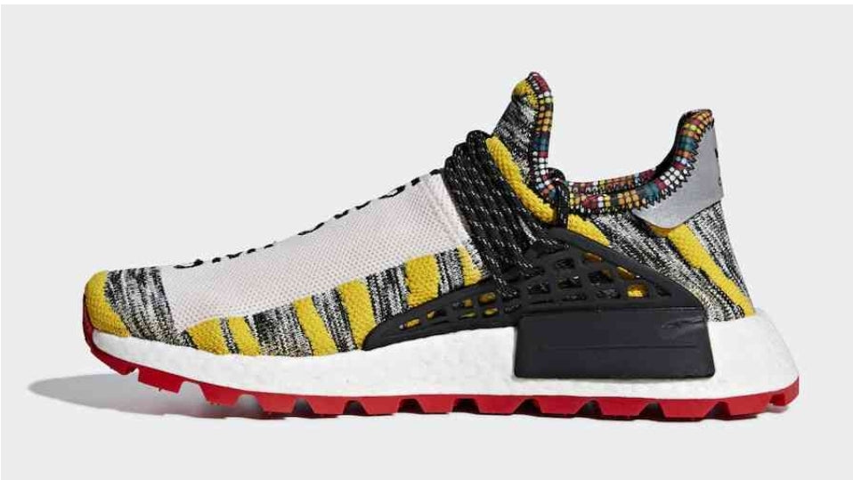 les baskets Adidas Human Race NMD x Pharrell Yellow " Femme  sont un témoignage de l'engagement d'Adidas à combiner style et innovation.