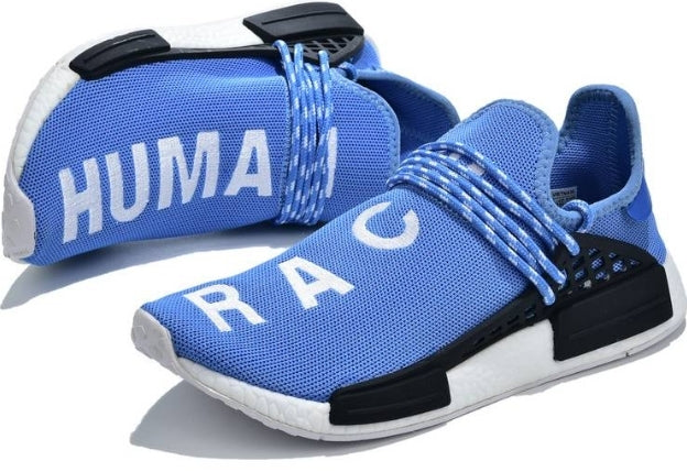 les baskets Adidas Human Race NMD x Pharrell Yellow " Femme  sont un témoignage de l'engagement d'Adidas à combiner style et innovation.