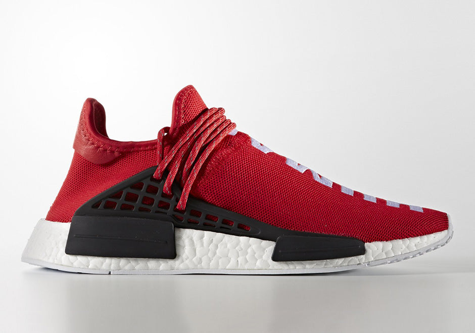 les baskets Adidas Human Race NMD x Pharrell Yellow " Femme  sont un témoignage de l'engagement d'Adidas à combiner style et innovation.