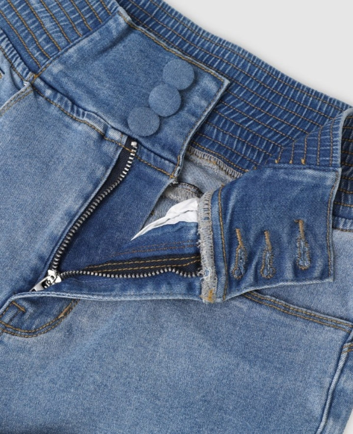 Premièrement : Ce jean taille haute à fronces et boutons sur le devant avec ceinture curveease jegging skinny évasé en demin femme.