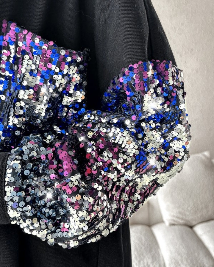 Premièrement : Apportez une touche d’éclat à votre look avec cette Veste décontractée à paillettes et patchwork à manches longues avec bouton sur le devant et ourlet brut femme 