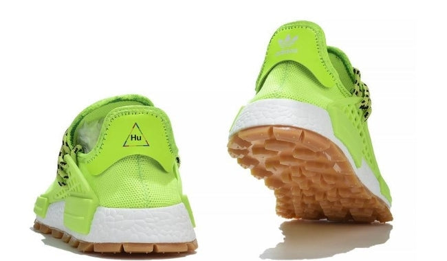 les baskets Adidas Human Race NMD x Pharrell Yellow " Femme  sont un témoignage de l'engagement d'Adidas à combiner style et innovation.