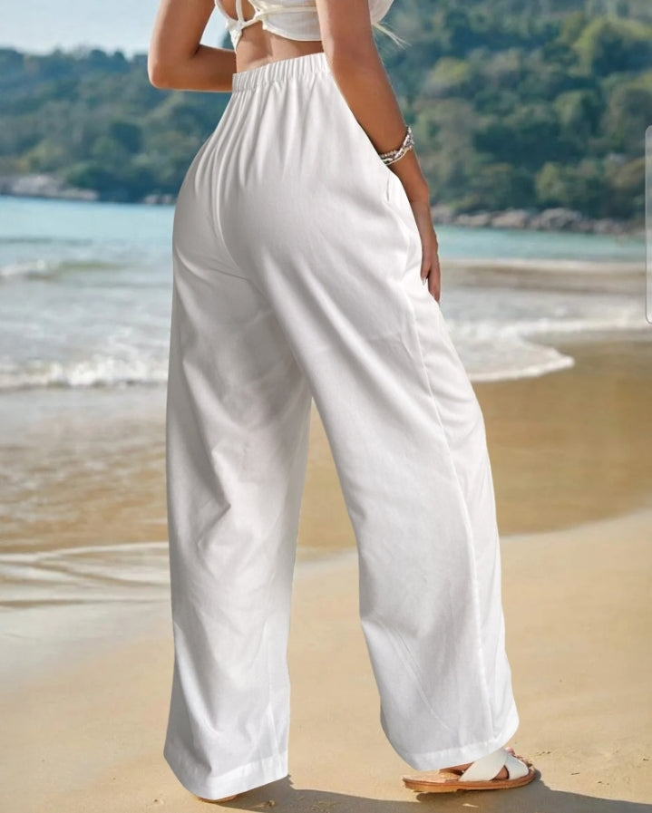 Premièrement : Ce Pantalon décontracté droit à cordons froncées Femme pour incarne l’équilibre parfait entre aisance et élégance au quotidien.