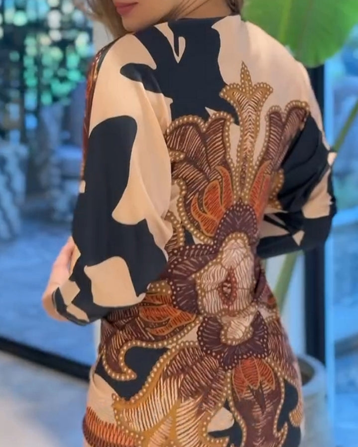 Premièrement : La  Robe moulante vintage baroque à manches longues et décolleté en V plongeant Femme.