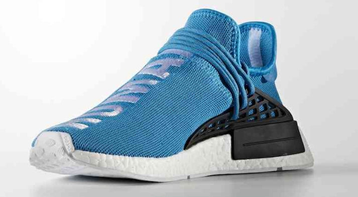 les baskets Adidas Human Race NMD x Pharrell Yellow " Femme  sont un témoignage de l'engagement d'Adidas à combiner style et innovation.