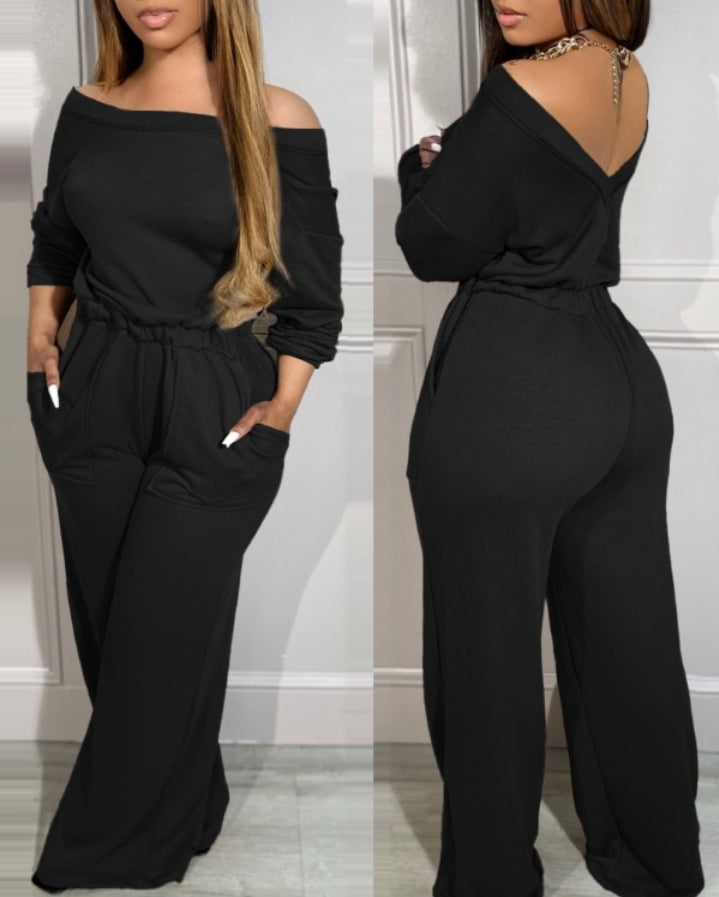 Combinaison à épaules dénudées et dos en V avec poches à la taille extensible femme