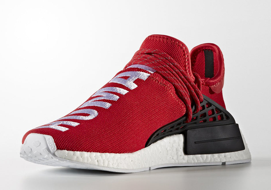 les baskets Adidas Human Race NMD x Pharrell Yellow " Femme  sont un témoignage de l'engagement d'Adidas à combiner style et innovation.