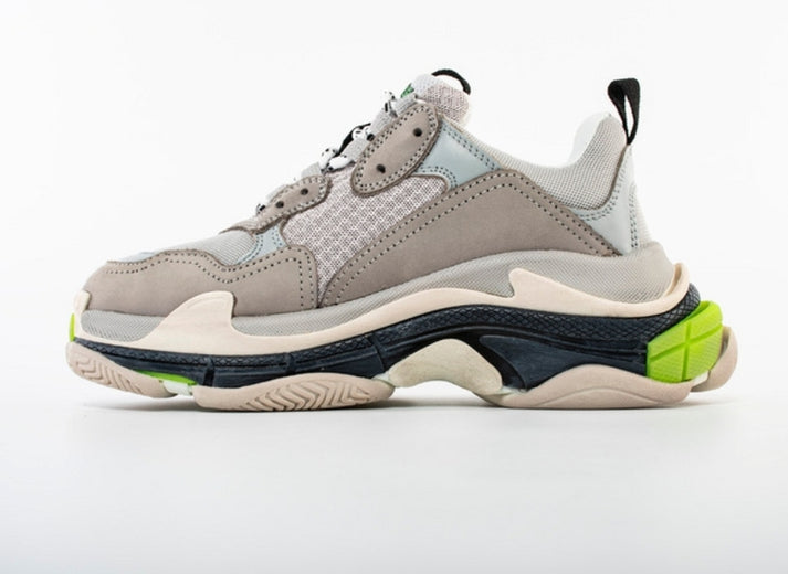 les sneakers Balenciaga Triple S "Beige Green Yellow" Femme sont un témoignage de l'engagement de Balenciaga à combiner style et innovation.