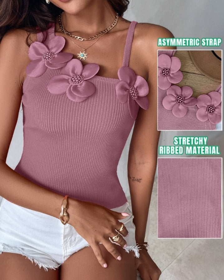 Premièrement : Ce 1 débardeur en tricot à motif floral et perles décoratives sans manches femme.