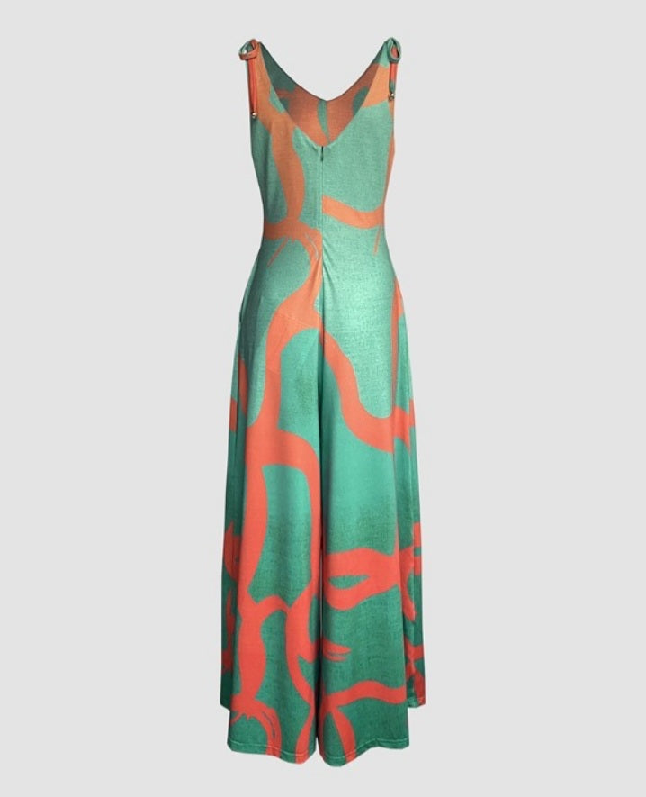 Premièrement : Apportez une touche de fraîcheur et de féminité à votre garde-robe avec cette Combinaison à imprimé floral, col en V, bretelles à lacets , style décontracté avec poches Femme.