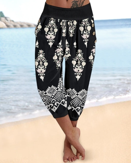 Premièrement : Ce Pantalon capri taille basse à imprimé plante tribales avec boutons décoratifs, pantalon de vacances avec poche femme .