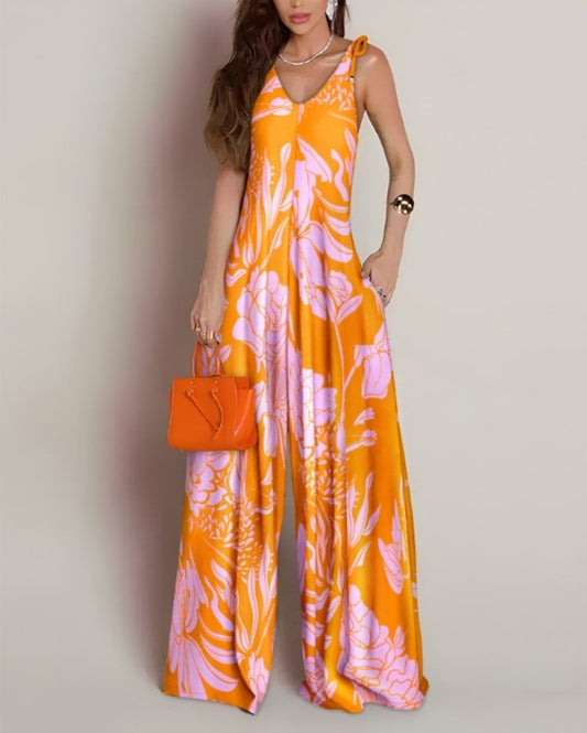 Premièrement : Apportez une touche de fraîcheur et de féminité à votre garde-robe avec cette Combinaison à imprimé floral, col en V, bretelles à lacets , style décontracté avec poches Femme.
