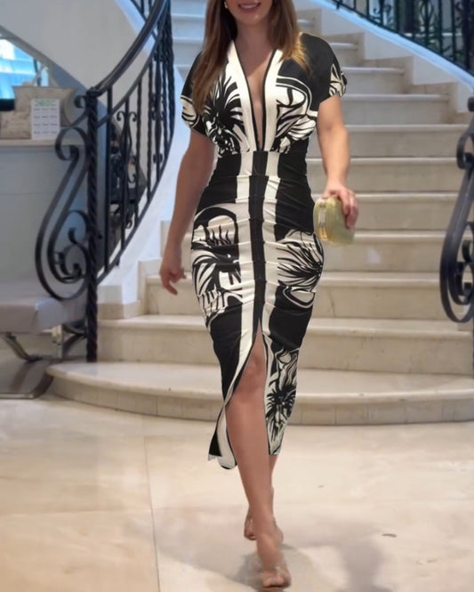 Premièrement : La  Robe moulante vintage baroque à manches longues et décolleté en V plongeant Femme.