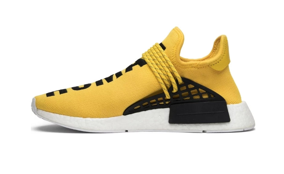 les baskets Adidas Human Race NMD x Pharrell Yellow " Femme  sont un témoignage de l'engagement d'Adidas à combiner style et innovation.