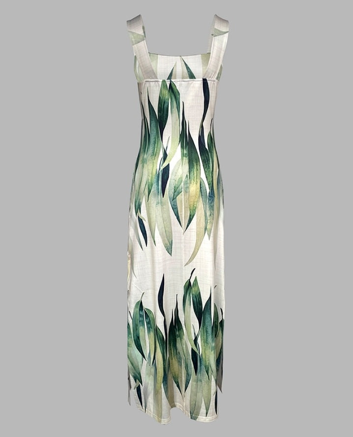 Premièrement : Cette robe longue décontractée à bretelles épaisses et imprimé végétal, coupe ajustée et fendue avec poches Femme.