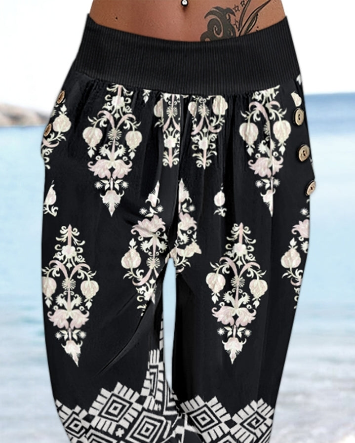 Premièrement : Ce Pantalon capri taille basse à imprimé plante tribales avec boutons décoratifs, pantalon de vacances avec poche femme .