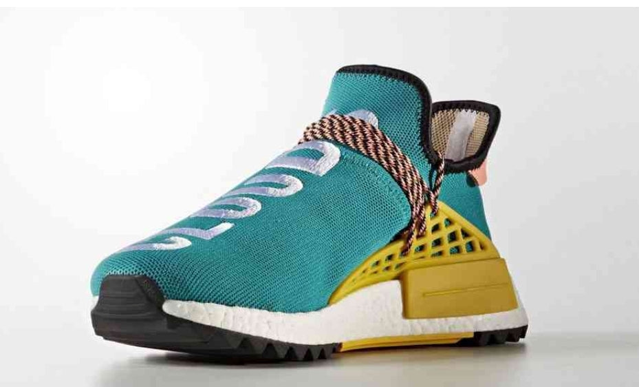 les baskets Adidas Human Race NMD x Pharrell Yellow " Femme  sont un témoignage de l'engagement d'Adidas à combiner style et innovation.