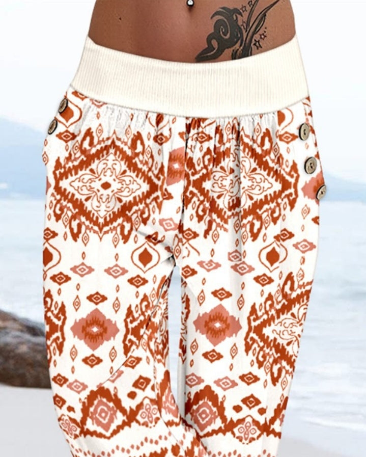 Premièrement : Ce Pantalon capri taille basse à imprimé plante tribales avec boutons décoratifs, pantalon de vacances avec poche femme .