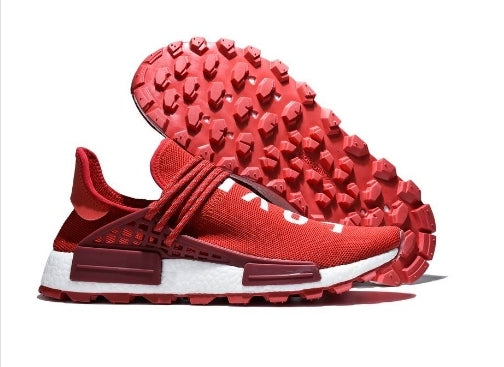 les baskets Adidas Human Race NMD x Pharrell Yellow " Femme  sont un témoignage de l'engagement d'Adidas à combiner style et innovation.