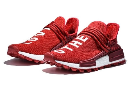 les baskets Adidas Human Race NMD x Pharrell Yellow " Femme  sont un témoignage de l'engagement d'Adidas à combiner style et innovation.