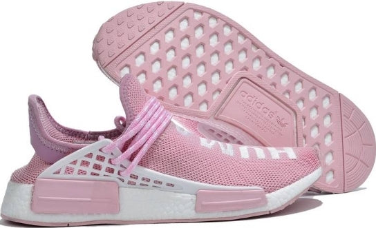 les baskets Adidas Human Race NMD x Pharrell Yellow " Femme  sont un témoignage de l'engagement d'Adidas à combiner style et innovation.