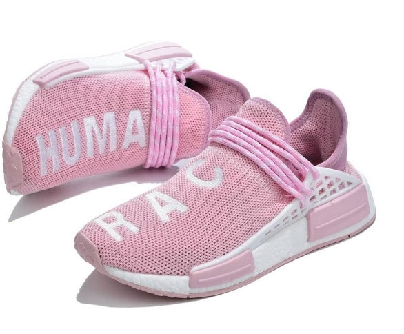 les baskets Adidas Human Race NMD x Pharrell Yellow " Femme  sont un témoignage de l'engagement d'Adidas à combiner style et innovation.