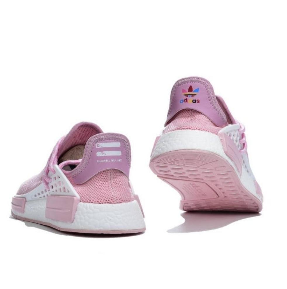 les baskets Adidas Human Race NMD x Pharrell Yellow " Femme  sont un témoignage de l'engagement d'Adidas à combiner style et innovation.
