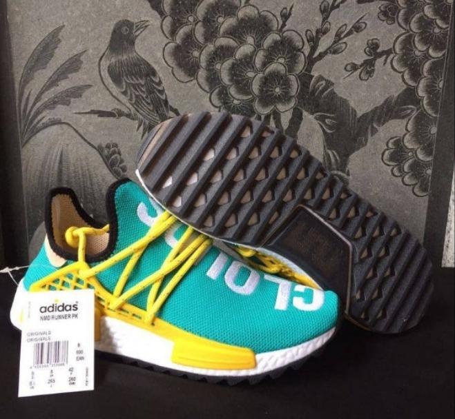 les baskets Adidas Human Race NMD x Pharrell Yellow " Femme  sont un témoignage de l'engagement d'Adidas à combiner style et innovation.