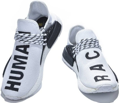 les baskets Adidas Human Race NMD x Pharrell Yellow " Femme  sont un témoignage de l'engagement d'Adidas à combiner style et innovation.