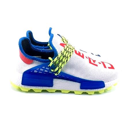 les baskets Adidas Human Race NMD x Pharrell Yellow " Femme  sont un témoignage de l'engagement d'Adidas à combiner style et innovation.