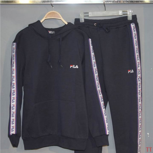 Les ensembles survêtement FILA combinent performance et style. Leur design sportif et leur qualité fiable.pas cher.le moins cher.