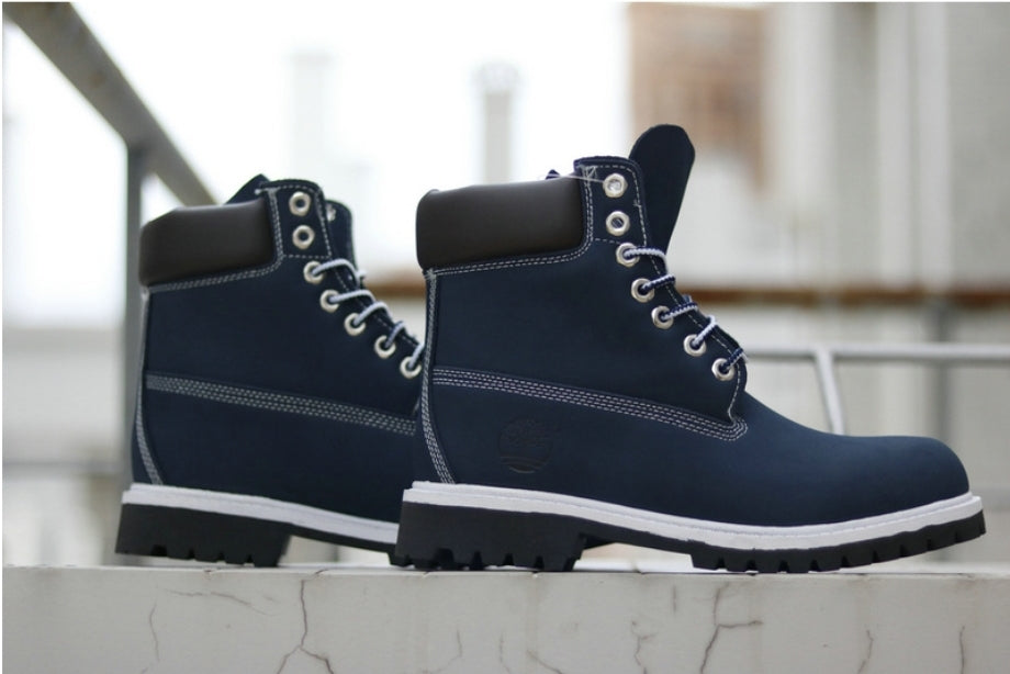Les baskets Botte Timberland   intemporel et robustesse.  design qualité supérieure les rendent indispensables  aventuriers.pas cher. Le moins cher.