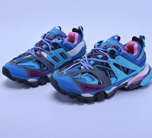 les sneakers Balenciaga Triple S "Beige Green Yellow" Femme sont un témoignage de l'engagement de Balenciaga à combiner style et innovation.
